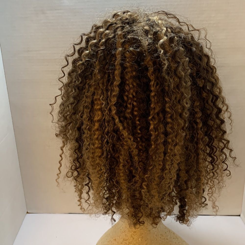 Streaky coils wig with three front and one rear comb